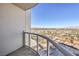 Balcony showcases panoramic city views beyond a glass railing, perfect for outdoor relaxation at 200 W Sahara Ave # 2108, Las Vegas, NV 89102