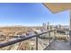 Balcony offers a panoramic view of the city skyline and distant mountains on a bright day at 200 W Sahara Ave # 2108, Las Vegas, NV 89102