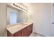 Bathroom featuring sleek vanity with marble countertop and modern fixtures, adjacent to the doorway at 200 W Sahara Ave # 2108, Las Vegas, NV 89102