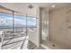 Modern bathroom featuring a walk-in shower and expansive city views at 200 W Sahara Ave # 2108, Las Vegas, NV 89102