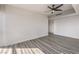 Bright bedroom features hardwood floors and a ceiling fan at 200 W Sahara Ave # 2108, Las Vegas, NV 89102