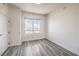 Sunlit bedroom with a large window offering an expansive city view at 200 W Sahara Ave # 2108, Las Vegas, NV 89102