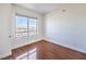 Sun-filled room with wood floors, a window offering city views, and a fresh, clean aesthetic at 200 W Sahara Ave # 2108, Las Vegas, NV 89102