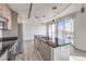 Well-lit kitchen with modern appliances and island at 200 W Sahara Ave # 2108, Las Vegas, NV 89102