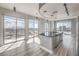 Bright, open kitchen with stainless steel appliances, a kitchen island, and stunning city views from the large windows at 200 W Sahara Ave # 2108, Las Vegas, NV 89102
