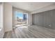 Bright, open living room with stunning city views through large sliding glass doors at 200 W Sahara Ave # 2108, Las Vegas, NV 89102