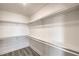 Large walk-in closet with multiple shelves and hardwood floors, perfect for organization at 200 W Sahara Ave # 2108, Las Vegas, NV 89102