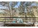 Balcony view showcasing the pool and surrounding greenery, creating a serene and inviting outdoor space at 260 E Flamingo Rd # 311, Las Vegas, NV 89169