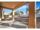 Expansive backyard with neutral ground cover and a large covered patio perfect for entertaining and relaxation at 2612 Springridge Dr, Las Vegas, NV 89134