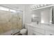 Modern bathroom featuring a walk-in shower with glass door and white vanity at 2612 Springridge Dr, Las Vegas, NV 89134