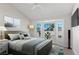 Serene bedroom featuring a bay window, neutral color palette, and ample natural light at 2612 Springridge Dr, Las Vegas, NV 89134