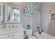 Bathroom featuring a marble countertop vanity, toilet, and tiled shower and tub at 2796 Rosenhearty Dr, Henderson, NV 89044