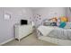 Bedroom featuring a white dresser, plush carpet and soft natural light at 2796 Rosenhearty Dr, Henderson, NV 89044