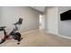 Bedroom with exercise equipment and access to the hallway at 2796 Rosenhearty Dr, Henderson, NV 89044