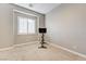 Bedroom with a large window, neutral paint, and plush carpet at 2796 Rosenhearty Dr, Henderson, NV 89044