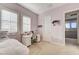 Bedroom featuring a study desk with natural light and plush carpet at 2796 Rosenhearty Dr, Henderson, NV 89044