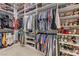 Walk-in closet with organized shelving and ample hanging space for clothes and shoes at 2796 Rosenhearty Dr, Henderson, NV 89044