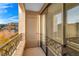 Balcony view with door and sliding glass at 29 Montelago Blvd # 205, Henderson, NV 89011