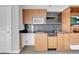 Close-up on a modern kitchen with built in cabinets and stainless steel appliances at 29 Montelago Blvd # 205, Henderson, NV 89011