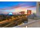 Balcony view showcasing the vibrant cityscape at sunset with views of the Wynn and Encore at 360 E Desert Inn Rd # 602, Las Vegas, NV 89109