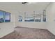 Open and bright room showcasing neutral carpet and gorgeous city views at 360 E Desert Inn Rd # 602, Las Vegas, NV 89109