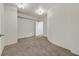 Spacious bedroom with neutral carpet, light walls, and modern lighting at 360 E Desert Inn Rd # 602, Las Vegas, NV 89109