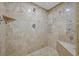 Modern walk-in shower with custom tile work and a built-in seat at 360 E Desert Inn Rd # 602, Las Vegas, NV 89109