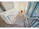 Modern staircase with metal railing and lots of natural light from large windows at 360 E Desert Inn Rd # 602, Las Vegas, NV 89109