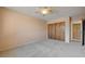 This bedroom features carpeted floors, a ceiling fan, and a closet at 3716 N Torrey Pines Dr, Las Vegas, NV 89108