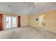 Bright living room featuring double doors to the outside and an open layout at 3716 N Torrey Pines Dr, Las Vegas, NV 89108