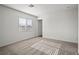 Cozy bedroom with neutral carpet, a window with blinds, and ample natural light at 4223 Gold Desert St, North Las Vegas, NV 89032