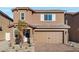 Charming two-story home featuring a beautiful brick driveway and a two-car garage at 4223 Gold Desert St, North Las Vegas, NV 89032