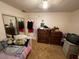 Bedroom featuring a cozy bed and vintage fan at 4312 Alpine Pl, Las Vegas, NV 89107