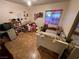 Bedroom featuring a cozy bed and wood flooring at 4312 Alpine Pl, Las Vegas, NV 89107