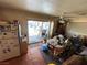 Dining area with tiled floors and a sliding glass door providing backyard access and natural light at 4312 Alpine Pl, Las Vegas, NV 89107