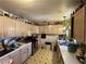 A well-lit kitchen featuring many upper and lower cabinets, plenty of counter space and stainless steel appliances at 4312 Alpine Pl, Las Vegas, NV 89107