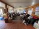 Cozy living room featuring a large open space, tile floors, neutral paint, and plenty of natural light at 4312 Alpine Pl, Las Vegas, NV 89107