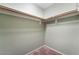 A walk-in closet featuring wall-to-wall shelving for maximum storage at 4425 Woodpine Dr # 104, Las Vegas, NV 89119