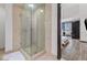 Luxurious shower with glass doors and access to a private balcony at 4575 Dean Martin Dr # 505, Las Vegas, NV 89103