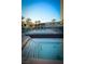 Hot tub with views of a community pool, surrounding trees and city building at 4575 Dean Martin Dr # 505, Las Vegas, NV 89103