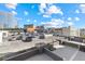 Exterior view of parking lot and nearby buildings under a bright blue sky at 4575 Dean Martin Dr # 505, Las Vegas, NV 89103