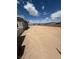 This backyard features a dirt yard, ready for landscaping at 4630 Blushing Dawn Ave, Las Vegas, NV 89118