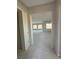 The hallway features a view into the living room and backyard at 4630 Blushing Dawn Ave, Las Vegas, NV 89118