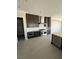 Gourmet kitchen with stainless steel appliances, sleek cabinetry, and ample counter space at 4630 Blushing Dawn Ave, Las Vegas, NV 89118