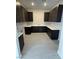 Large laundry room with sleek cabinets and plenty of counter space at 4630 Blushing Dawn Ave, Las Vegas, NV 89118