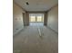 The living room features large windows, recessed lights, and neutral walls at 4630 Blushing Dawn Ave, Las Vegas, NV 89118