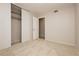 Bedroom featuring neutral carpet and closet with sliding doors at 4666 Amberwood Ln, Las Vegas, NV 89147