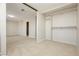 Spacious main bedroom featuring neutral carpet and a closet with shelving for ample storage at 4666 Amberwood Ln, Las Vegas, NV 89147