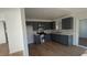 Updated kitchen featuring gray cabinets, stainless steel appliances, and decorative tile backsplash at 4816 Greencreek Dr, Las Vegas, NV 89110