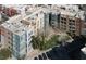 Overhead view of the condominium buildings, showcasing their architectural details, landscaping, and parking facilities at 50 E Serene Ave # 123, Las Vegas, NV 89123